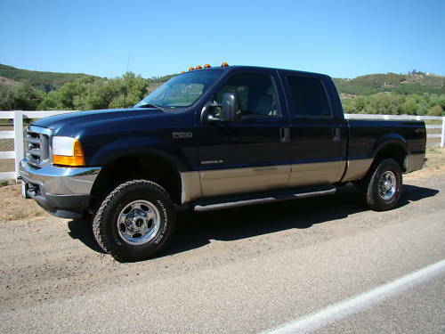 99-04 FORD F250/350 2" LEVELING LIFT KIT 4x4 - LEAF SPRINGS, SHOCKS w/ SHOCK BOOTS